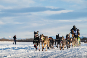 Teams arriving into the first checkpoint of the 2025 Fairbanks route, Nenana
