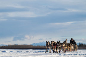 Teams arriving into the first checkpoint of the 2025 Fairbanks route, Nenana