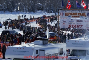 Sunday, March 4, 2012  A crowd of spectators lined the starting chute at the restart of Iditarod 2012 in Willow, Alaska.