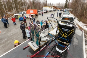 Sleds, sled dogs, and people gather at the mandatory pre-race veterinary checkup held at Iditarod headquarters in Wasilla on Wednesday March 4, 2015 during the 2015 Iditarod(C) Jeff Schultz/SchultzPhoto.com - ALL RIGHTS RESERVED DUPLICATION  PROHIBITED  WITHOUT  PERMISSION