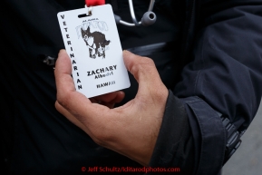 Zachary Albudrl's badge of honor at the mandatory pre-race veterinary checkup held at Iditarod headquarters in Wasilla on Wednesday March 4, 2015 during the 2015 Iditarod(C) Jeff Schultz/SchultzPhoto.com - ALL RIGHTS RESERVED DUPLICATION  PROHIBITED  WITHOUT  PERMISSION