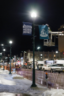 Installing 50th Iditarod banners.