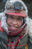 Marcelle Fressineau is frosted up after her ride into Rohn on Tuesday March 4 during Iditarod 2014 . PHOTO BY JEFF SCHULTZ/IDITARODPHOTOS.COM  USE ONLY WITH PERMISSION