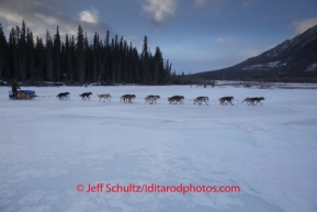 Dallas Seavey Runs on the South Fork of the Kuskokwim after leaving Rohn on Tuesday March 4 during Iditarod 2014 . PHOTO BY JEFF SCHULTZ/IDITARODPHOTOS.COM  USE ONLY WITH PERMISSION