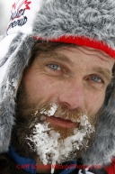 Monday March 5, 2012  Frosty bearded Hank Debruin at the Finger Lake checkpoint during Iditarod 2012.