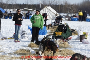 Courtney Petruska, right, and Katy Roberts take photos at the Nikolai checkpoint March 5, 2013.