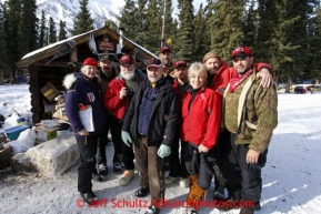 Some of the volunteers at the Rohn checkpoint pose for a photo during the 2013 Iditarod sled Dog Race   March 5, 2013.Photo by Jeff Schultz Do Not Reproduce without permission