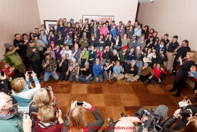 Millenium hotel manager Carol Fraser gives a toast to the field of mushers at the mandatory musher meeting on Thursday March 5, 2015 at the Millennium Hotel race headquarters in Anchorage.  Iditarod 2015 (C) Jeff Schultz/SchultzPhoto.com - ALL RIGHTS RESERVED DUPLICATION  PROHIBITED  WITHOUT  PERMISSION