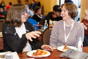 Iditarod musher Jan Steves has lunch with her Iditarider Nancy Augustine at the mandatory musher meeting on Thursday March 5, 2015 at the Millennium Hotel race headquarters in Anchorage.  Iditarod 2015 (C) Jeff Schultz/SchultzPhoto.com - ALL RIGHTS RESERVED DUPLICATION  PROHIBITED  WITHOUT  PERMISSION