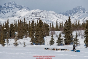 Mats Pettersson runs on Puntilla Lake with the Alaska Range in the background shorlty before arriving at the Rainy Pass checkpoint during the 2018 Iditarod race on Monday March 05, 2018. Photo by Jeff Schultz/SchultzPhoto.com  (C) 2018  ALL RIGHTS RESERVED