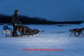 Ken Anderson leaves Nikolai  on Tuesday March 4 during the 2014 Iditarod.  PHOTO BY JEFF SCHULTZ / IDITARODPHOTOS.COM   DO NOT REPRODUCE WITHOUT PERMISSION