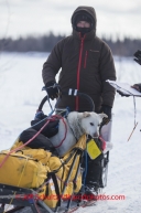 Danny Seavey arrives with a dog in the basket at the McGrath checkpoint on Wednesday March 5 , 2014 during the 2014 IditarodPHOTO BY JEFF SCHULTZ / IDITARODPHOTOS.COM  DO NOT REPRODUCE WITHOUT PERMISSION