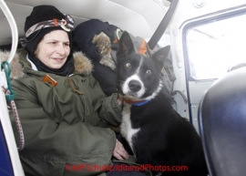 Tuesday March 6, 2012  Betsy Oesch in Bill Mayer's plane with a Sonny Lindner dropped dog in the morning at the Rainy Pass checkpoint, Iditarod 2012.