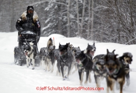 Wednesday March 7, 2012  Mike Santos on the road heading into the McGrath checkpoint. Iditarod 2012.