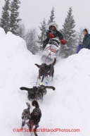 Wednesday March 7, 2012  Curt Perano and team runs down the river bank onto the Kuskokwim river after leaving the McGrath checkpoint. Iditarod 2012.