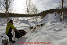 Wednesday March 7, 2012  Trent Herbst on the road toward Ophir after leaving the Takotna checkpoint.   Iditarod 2012.