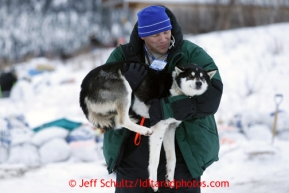 Volunteer vet Greg Reppas carries a dropped dog at the halfway checkpoint of Iditarod on Thursday March 7, 2013.

Iditarod Sled Dog Race 2013

Photo by Jeff Schultz copyright 2013 DO NOT REPRODUCE WITHOUT PERMISSION