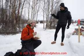 Lance Mackey, wearing slippers, talks with his brother Jason as he eats a meal at the halfway checkpoint of Iditarod on Thursday March 7, 2013.

Iditarod Sled Dog Race 2013

Photo by Jeff Schultz copyright 2013 DO NOT REPRODUCE WITHOUT PERMISSION