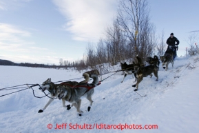 Dallas Seavey team runs down the river bank just before the  halfway checkpoint of Iditarod on Thursday March 7, 2013.

Iditarod Sled Dog Race 2013

Photo by Jeff Schultz copyright 2013 DO NOT REPRODUCE WITHOUT PERMISSION