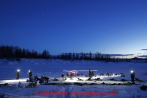 Teams rest on the river as dusk falls on the halfway checkpoint of Iditarod on Thursday March 7, 2013.

Iditarod Sled Dog Race 2013

Photo by Jeff Schultz copyright 2013 DO NOT REPRODUCE WITHOUT PERMISSION