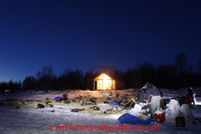 Dallas Seavey and other teams rest in the evening at the halfway checkpoint of Iditarod on Thursday March 7, 2013.

Iditarod Sled Dog Race 2013

Photo by Jeff Schultz copyright 2013 DO NOT REPRODUCE WITHOUT PERMISSION