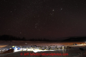 A clear sky shows the stars as dog teams rest on the river at the halfway checkpoint of Iditarod on Thursday March 7, 2013.

Iditarod Sled Dog Race 2013

Photo by Jeff Schultz copyright 2013 DO NOT REPRODUCE WITHOUT PERMISSION