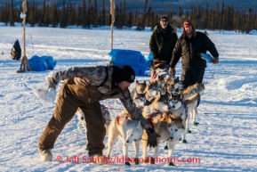 Mike Ellis and team depart the Cripple checkpoint on Friday, March 7, during the Iditarod Sled Dog Race 2014.PHOTO (c) BY JEFF SCHULTZ/IditarodPhotos.com -- REPRODUCTION PROHIBITED WITHOUT PERMISSION