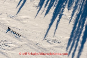 John Baker drives his dog team along the Yukon River from Ruby toward Galena on Friday, March 7, during the Iditarod Sled Dog Race 2014.PHOTO (c) BY JEFF SCHULTZ/IditarodPhotos.com -- REPRODUCTION PROHIBITED WITHOUT PERMISSION