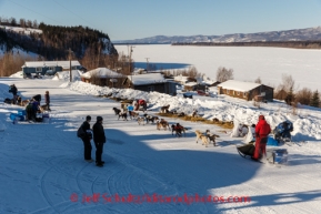 Ray Redington, Jr., leaves the Yukon village of Ruby after an 8-hour layover on Friday, March 7, during the Iditarod Sled Dog Race 2014.PHOTO (c) BY JEFF SCHULTZ/IditarodPhotos.com -- REPRODUCTION PROHIBITED WITHOUT PERMISSION