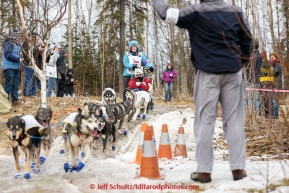 Paige Drobny and team run down a soggy trail during the cermonial start day of Iditarod 2015 in Anchorage, Alaska. Saturday March 7, 2015(C) Jeff Schultz/SchultzPhoto.com - ALL RIGHTS RESERVED DUPLICATION  PROHIBITED  WITHOUT  PERMISSION