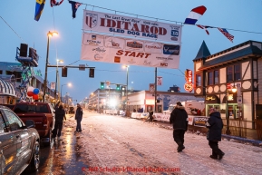 The 4th avenue start line at 4th and D street in the early mornning rain during the cermonial start day of Iditarod 2015. Saturday March 7, 2015(C) Jeff Schultz/SchultzPhoto.com - ALL RIGHTS RESERVED DUPLICATION  PROHIBITED  WITHOUT  PERMISSION