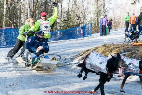 Ken Anderson rounds a bend at Goose Lake on the bike/ski trail during the cermonial start day of Iditarod 2015 in Anchorage, Alaska. Saturday March 7, 2015(C) Jeff Schultz/SchultzPhoto.com - ALL RIGHTS RESERVED DUPLICATION  PROHIBITED  WITHOUT  PERMISSION