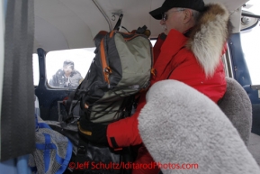 Thursday March, 2012    Volunteer Iditarod pilot Jerry Wortley packs his passenger's cargo in his Cessna 180 plane at the Takotna checkpoint.   Iditarod 2012.