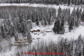 Thursday March, 2012   Volunteers stand outside the checkpoint at Ophir in this aerial photo.   Iditarod 2012.