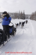 Thursday March, 2012  Rohn Buser 's team heads down the trail after leaving the Ophir checkpoint.   Iditarod 2012.