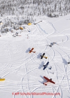 Thursday March, 2012   An aerial view of the Cripple   checkpoint shows parked planes and dog team parking areas.   Iditarod 2012.