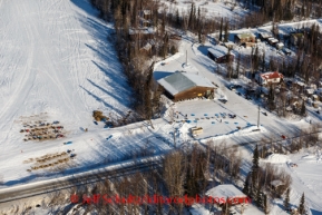 Justin Savidas checks into Galena in front of the community center as teams rest on Saturday March 8, during the Iditarod Sled Dog Race 2014.PHOTO (c) BY JEFF SCHULTZ/IditarodPhotos.com -- REPRODUCTION PROHIBITED WITHOUT PERMISSION