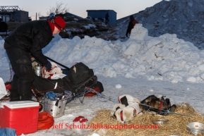 Aliy Zirkle packs her sled before leaving Unalakleet on Saturday March 8, during the Iditarod Sled Dog Race 2014.PHOTO (c) BY JEFF SCHULTZ/IditarodPhotos.com -- REPRODUCTION PROHIBITED WITHOUT PERMISSION