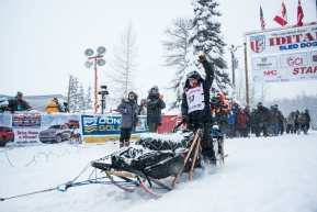 Iditarod 2020 starting line in Willow Alaska, rookie Kaci Murringer of Willow, AK takes off for Nome with her team of 14 dogs.