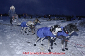 Friday March 9, 2012   Anjanette Steer leaves in the early morning hours from at the half-way checkpoint at Cripple.   Iditarod 2012.