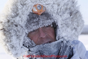 Friday March 9, 2012   Lachland Clarke is frosted up after a run in 30 below weather to reach the half-way checkpoint at Cripple.   Iditarod 2012.