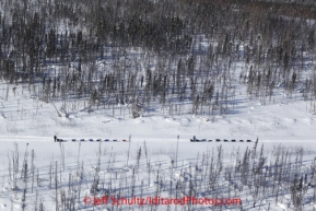 Friday March 9, 2012 Aerial view of Anjanette Steer (l) and Martin Buser (r) as they travel from the Cripple checkpoint to the Yukon River village of Ruby, Alaska. Iditarod 2012.