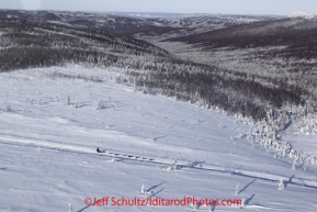 Friday March 9, 2012 Unknown musher and dog team on the way from the Cripple checkpoint to  the Yukon River village of Ruby, Alaska. Iditarod 2012.