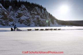 Friday March 9, 2012  John Baker runs on the Yukon River shortly after leaving the village of Ruby, Alaska. Iditarod 2012.