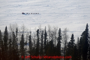 Deedee Jonrowe's team runs on the Yukon River between Eagle Island and Kaltag on Saturday March 9, 2013.Iditarod Sled Dog Race 2013Photo by Jeff Schultz copyright 2013 DO NOT REPRODUCE WITHOUT PERMISSION