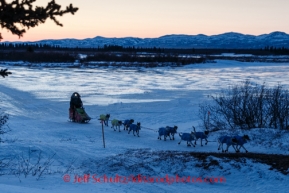 Wade Marrs on the Unalakleet River at dawn on the way into Unalakleet on Sunday, March 9, during the Iditarod Sled Dog Race 2014.PHOTO (c) BY JEFF SCHULTZ/IditarodPhotos.com -- REPRODUCTION PROHIBITED WITHOUT PERMISSION