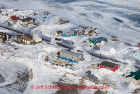 Teams rest outside the National Guard Armory building at Shaktoolik on Sunday, March 9, during the Iditarod Sled Dog Race 2014.PHOTO (c) BY JEFF SCHULTZ/IditarodPhotos.com -- REPRODUCTION PROHIBITED WITHOUT PERMISSION