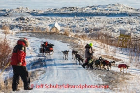 Jeff King runs back up the road after taking a wrong turn on his way out of Koyuk on Sunday, March 9, during the Iditarod Sled Dog Race 2014.PHOTO (c) BY JEFF SCHULTZ/IditarodPhotos.com -- REPRODUCTION PROHIBITED WITHOUT PERMISSION