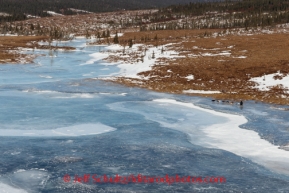 John Baker on river ice on the trail between Unalakleet and Shaktoolik on Sunday, March 9, during the Iditarod Sled Dog Race 2014.PHOTO (c) BY JEFF SCHULTZ/IditarodPhotos.com -- REPRODUCTION PROHIBITED WITHOUT PERMISSION