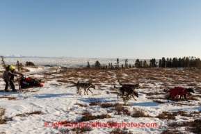 Jeff King runs in the snow and tussock trail leaving Koyuk on Sunday, March 9, during the Iditarod Sled Dog Race 2014.PHOTO (c) BY JEFF SCHULTZ/IditarodPhotos.com -- REPRODUCTION PROHIBITED WITHOUT PERMISSION